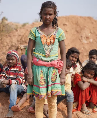 POOJA BURLA, 11, HAS WORKED IN MICA MINES SINCE SHE WAS 8. PHOTOGRAPHED BY JACK PEARCE.