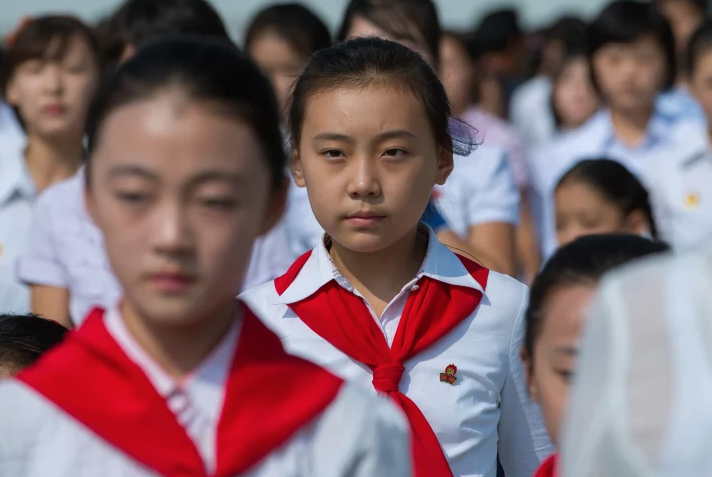 PHOTO: ERIC LAFFORGUE/ART IN ALL OF US/CORBIS/GETTY Pins must be worn to honor Kim Jong-un.