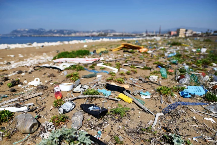 PHOTO: SALVATORE LAPORTA/KONTROLAB /LIGHTROCKET/GETTY IMAGES.A beach in Naples, Italy, is covered in plastic pollution. Experts estimate there will be more pounds of plastic in the ocean by 2050 than fish.